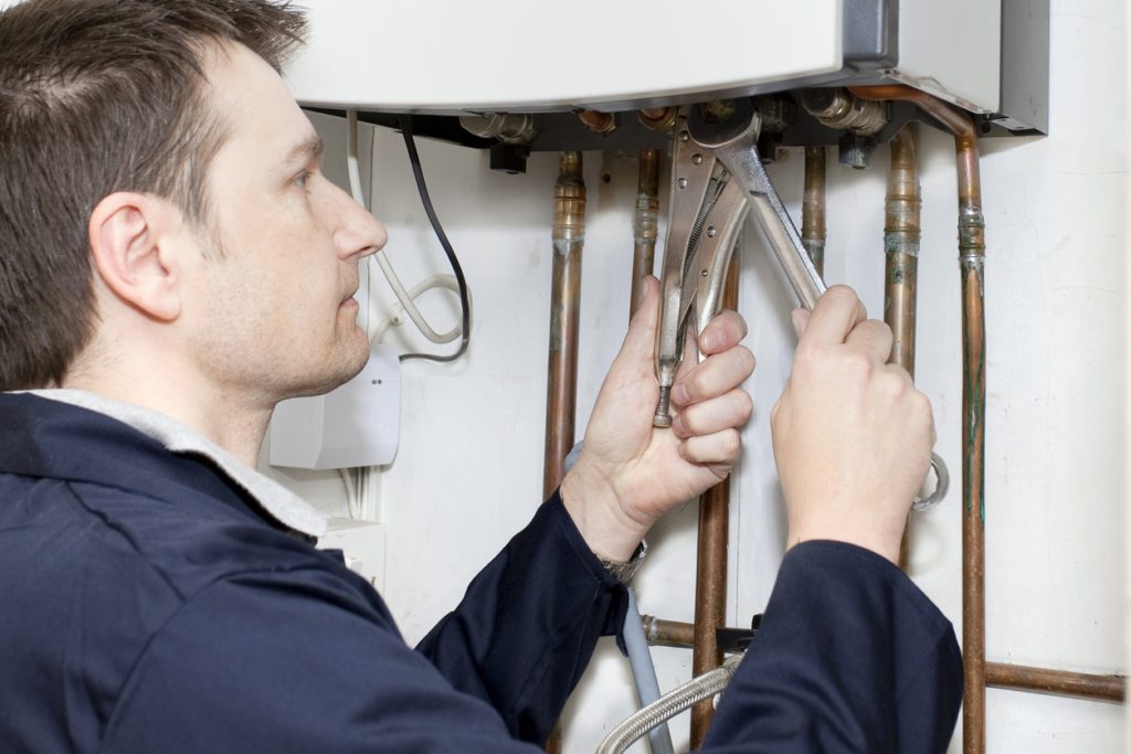 a heating contractor installing a heating system in a home in Portsmouth, VA